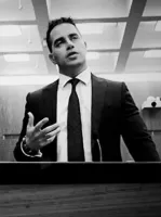 Mr. Julian J. Carash