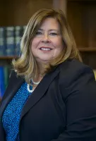 Ms. Christina J. Miller