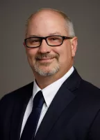 Mr. Dean E. Leazenby