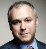 Mr. Justin M. Swartz 