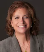 Carol M. Adinamis