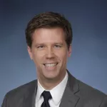 Mr. Kevin D. Koons