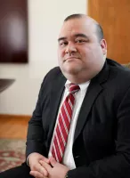 Gregory B. Thomlison, Esq.