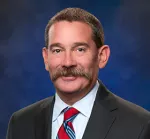 Timothy L. Warnock
