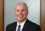 Daniel E. Coots