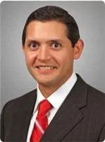 Mr. Marco A. Longoria