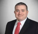 Christopher J. Holland