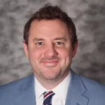 Ryan E. Scott