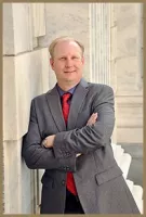 Mr. Cory A. Baird