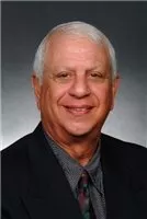 John W. Meshad