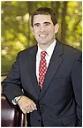 John E. Travers