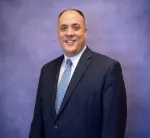 Philip E. Cordova, Esq
