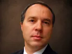 Mr. Rhett D. Klok