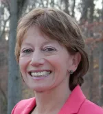 Laurie J. Woog