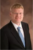 Mr. Georg M. Hasselmann, Ph.D., J.D.
